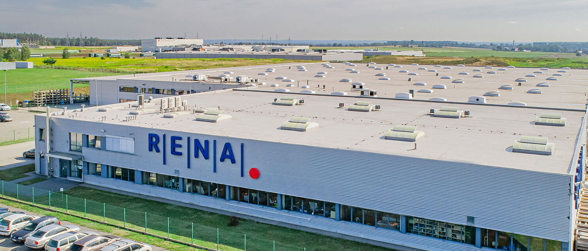 Luftaufnahme der RENA Polska mit Sitz in Wykroty, gelegen in einer Sonderwirtschaftszone nahe der deutschen Grenze mit einer Produktionsfläche von ca. 15.000 m²  Luftaufnahme der RENA Polska mit Sitz in Wykroty, gelegen in einer Sonderwirtschaftszone nahe der deutschen Grenze mit einer Produktionsfläche von ca. 15.000 m²