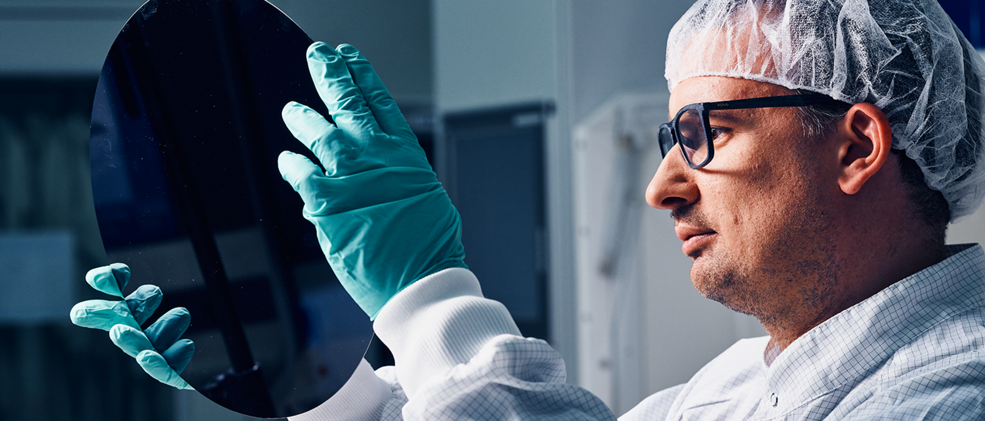 Black wafers Employees in white protective suits