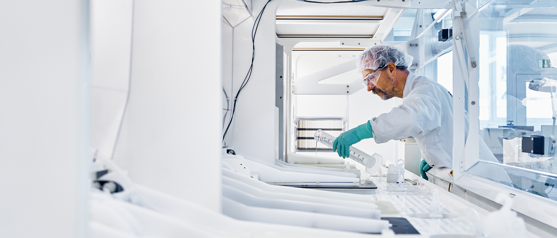 RENA employee working on a machine