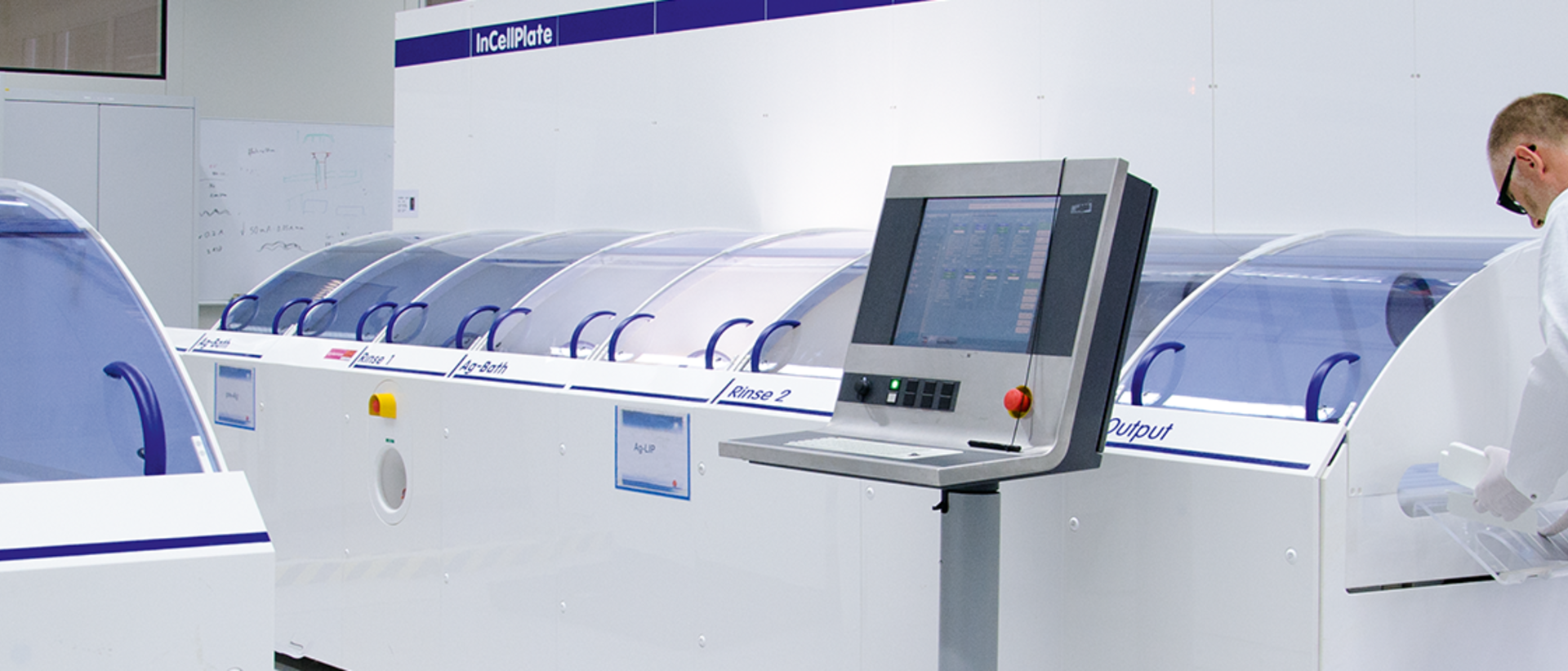 Employee working on a InCellPlate machine