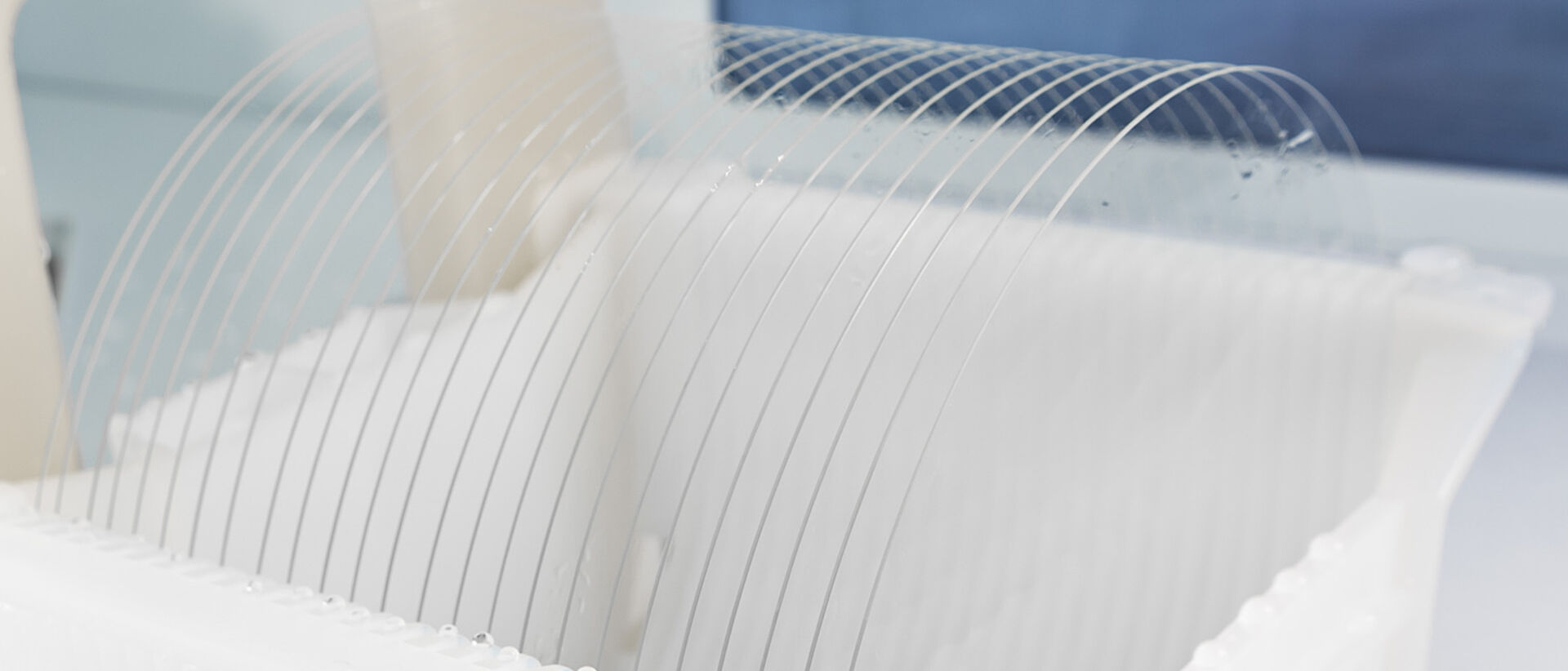 Glass platelets in white translucent carrier