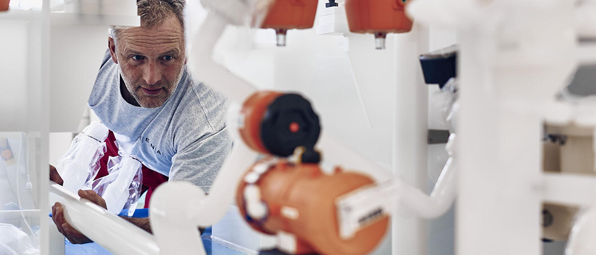 Technician doing maintenance on machine