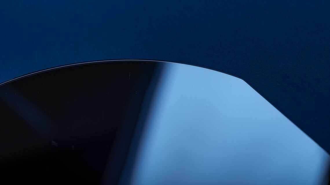 clean glass wafer blue background 